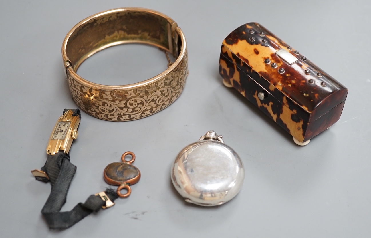 A group of mixed collectables including a George V silver sovereign case, a tortoiseshell small box, a gold plated bangle and a lady's small 18ct gold manual wind wrist watch, etc.